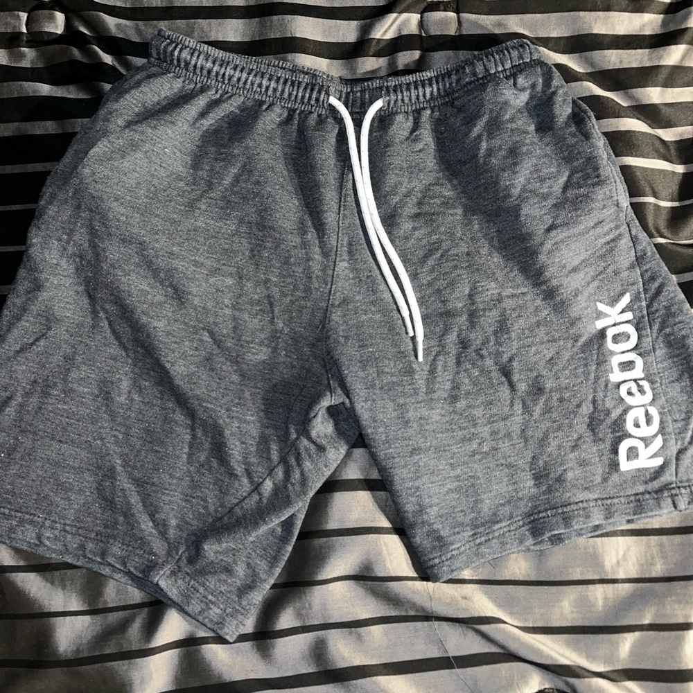 Grey and White Reebok shorts